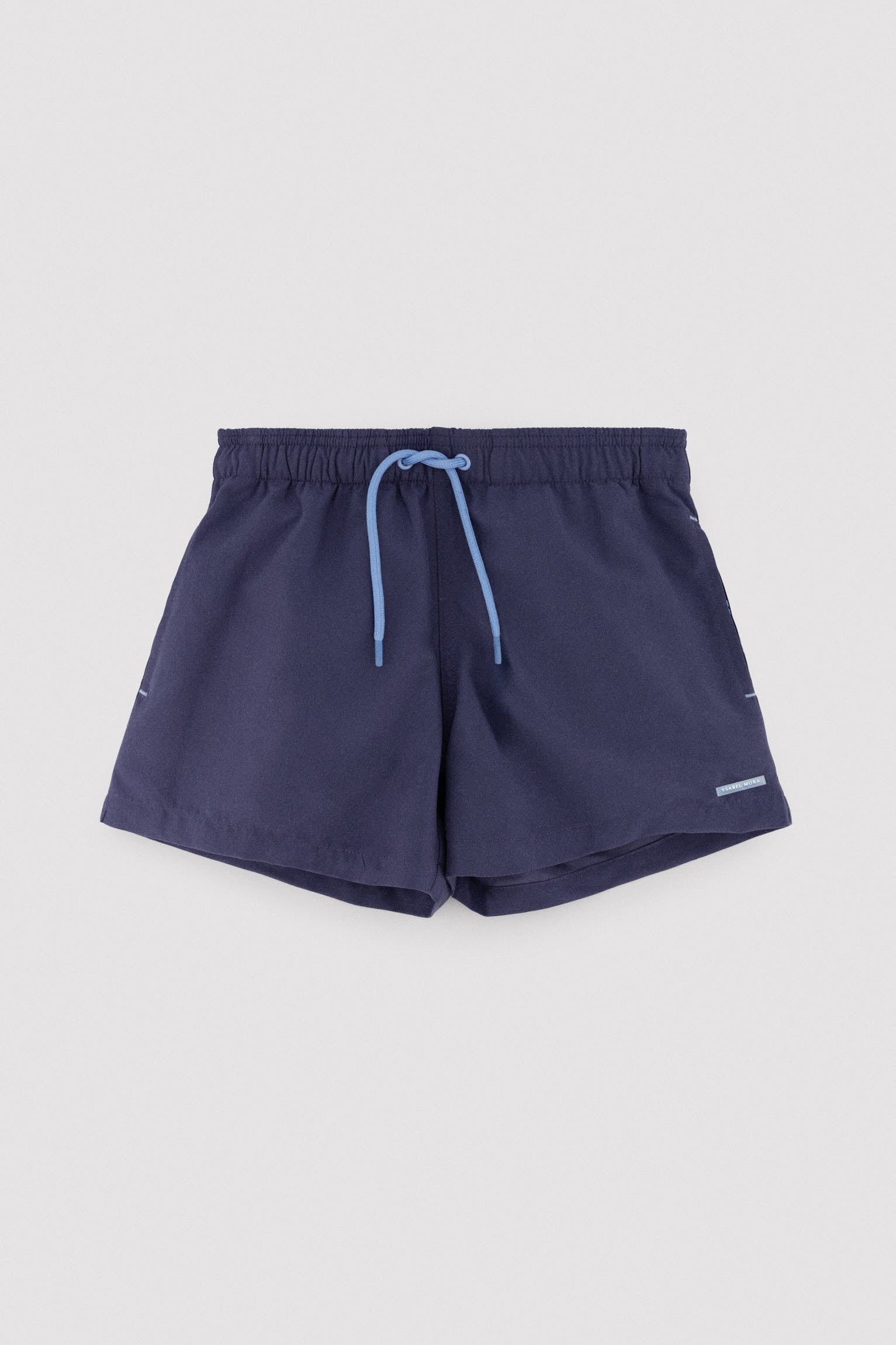 Boy's short swimming trunks with contrasting navy lining