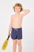 Boy's short swimming trunks with contrasting navy lining