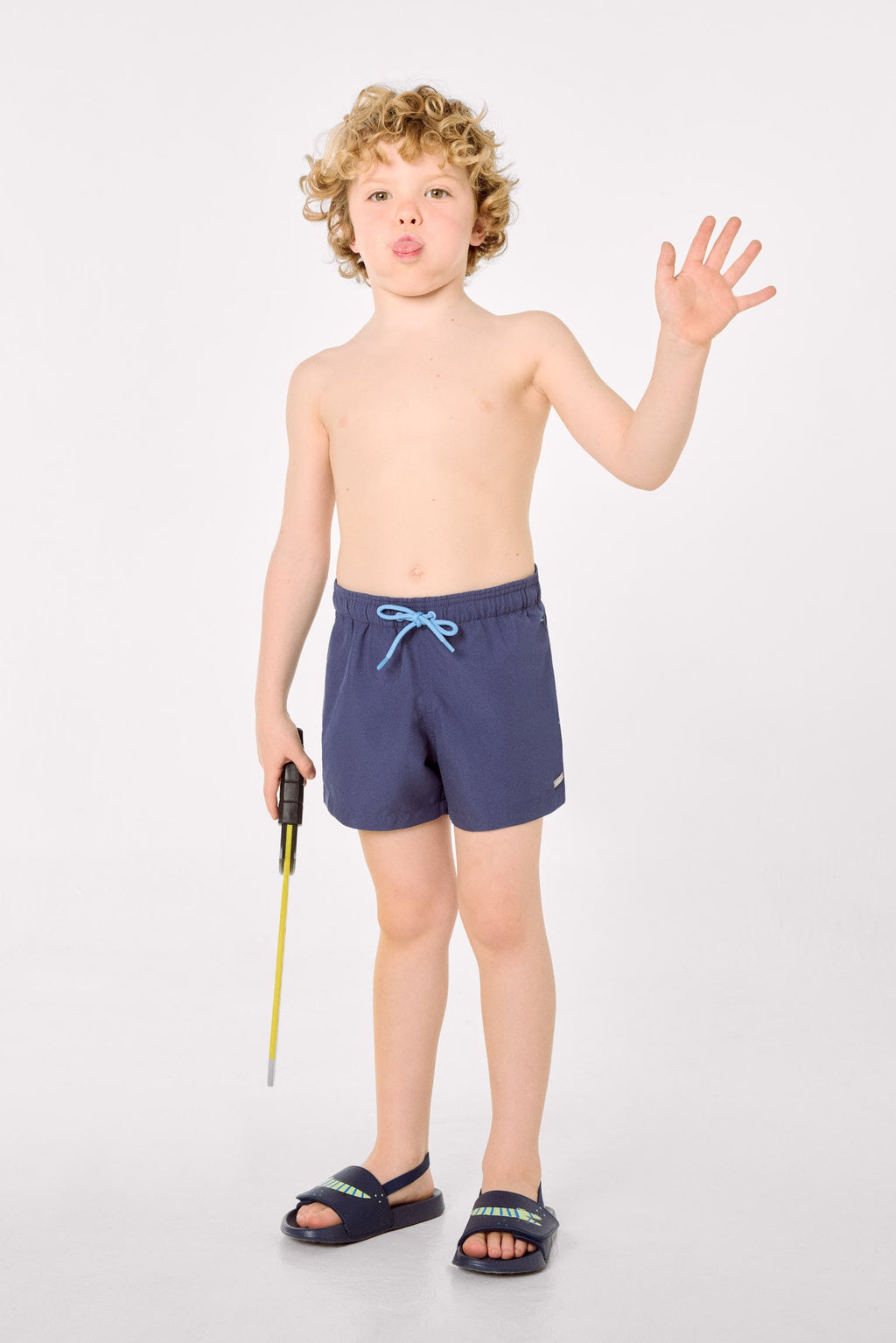 Boy's short swimming trunks with contrasting navy lining