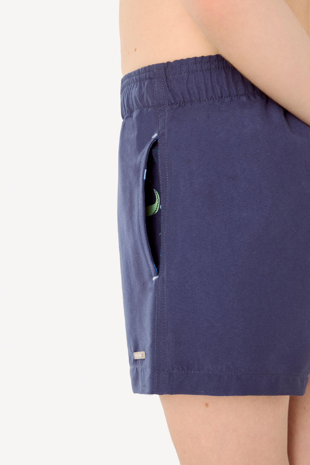 Boy's short swimming trunks with contrasting navy lining